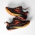 Męskie buty do biegania Brooks Ghost Trail – Black/Red/Orange